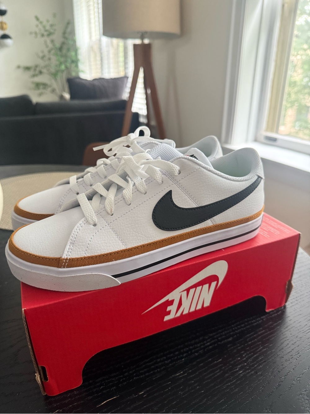 Nike Women’s White Sneakers with Black Swoosh and Brown Trim